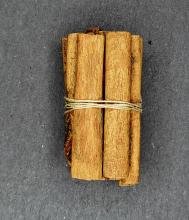 Cinnamon Cassia quills tied up in wrapping cord